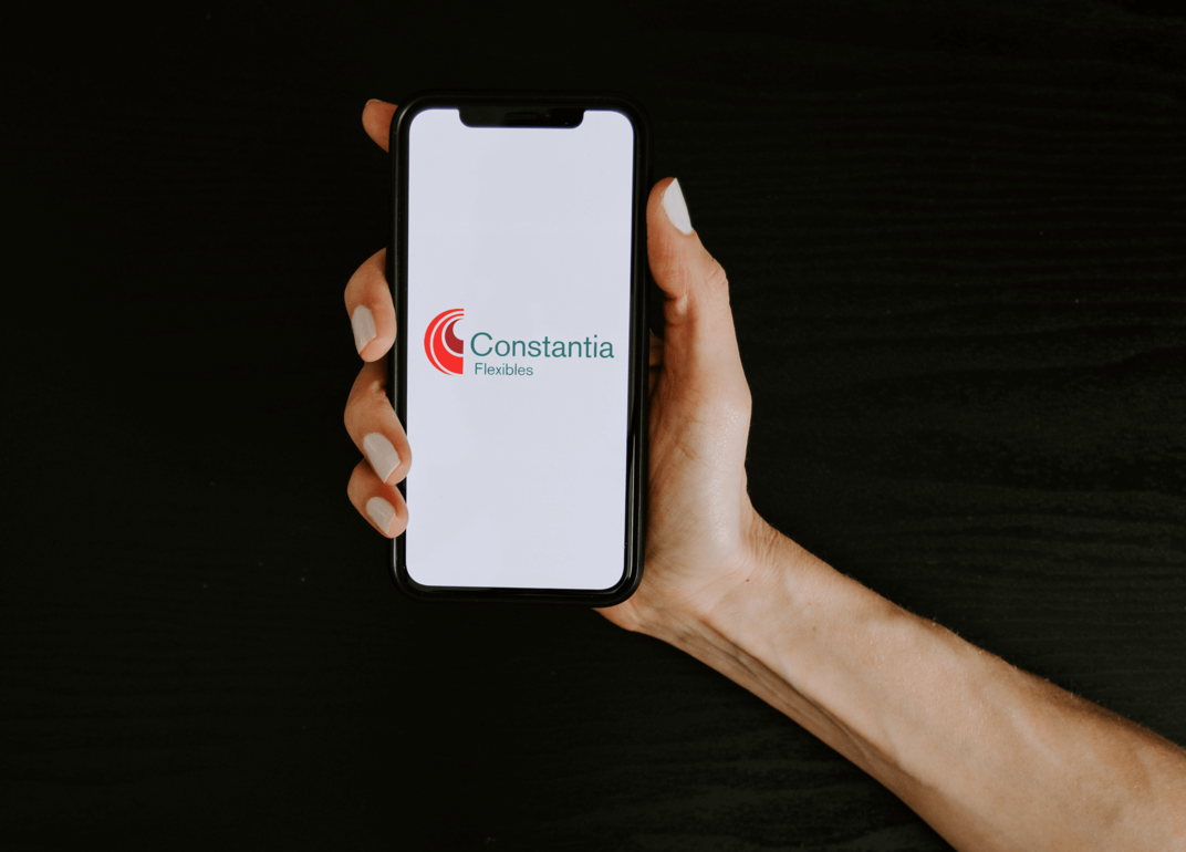 Technology hand with a phone